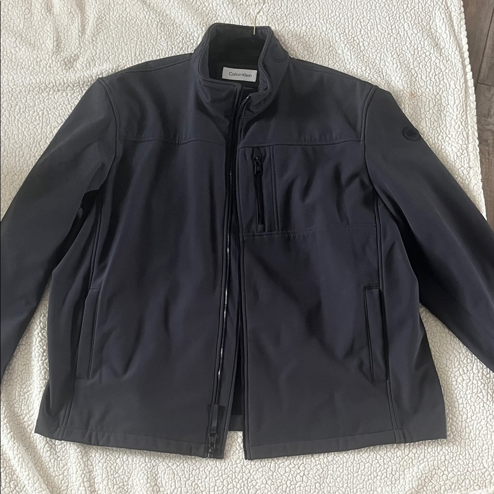 Calvin Klein Men's charcoal gray men’s lightweight jacket. Never worn.